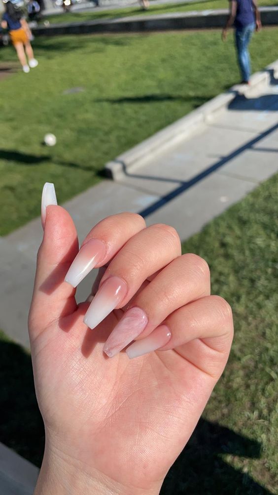 Pink and White Ombre With a Marble Accent Nail